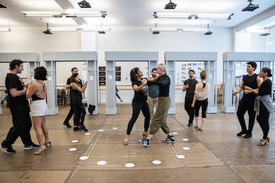 Shereen Pimentel and the company of Evita Photo