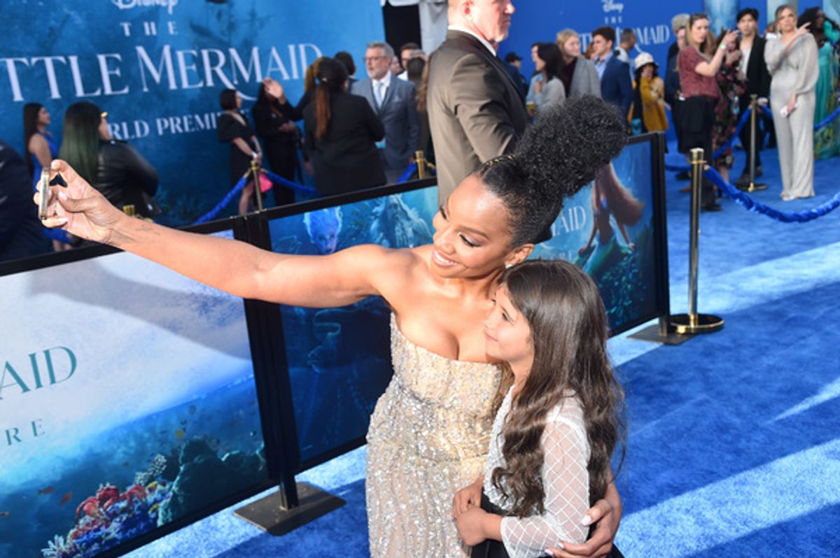 LOS ANGELES, CALIFORNIA - MAY 08: Anika Noni Rose (L) and a guest attend the World Premiere of Disney's live-action feature 'The Little Mermaid' at the Dolby Theatre in Los Angeles, California on May 08, 2023. (Photo by Alberto E. Rodriguez/Getty Images for Disney) at 