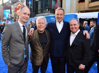 LOS ANGELES, CALIFORNIA - MAY 08: (L-R) Tom MacDougall, President, Walt Disney Music, Photo