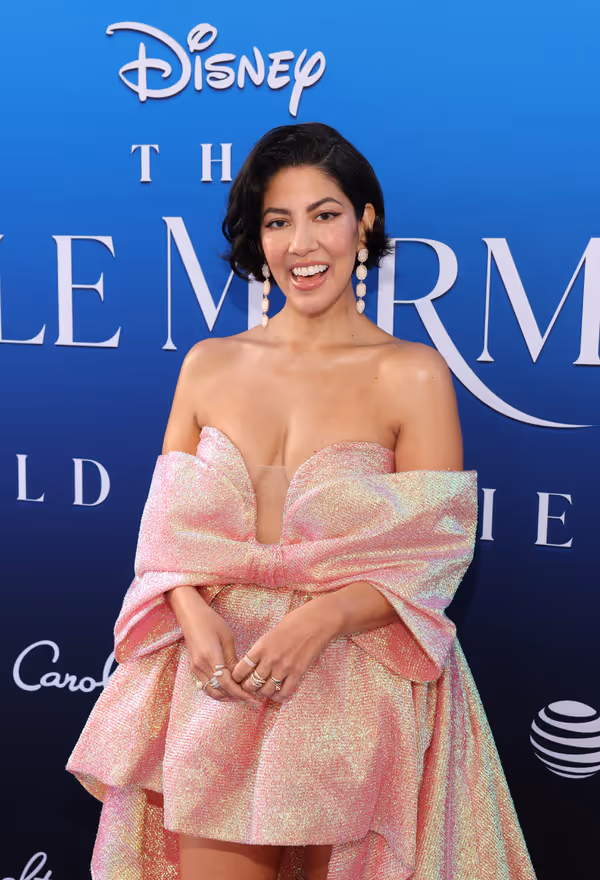 LOS ANGELES, CALIFORNIA - MAY 08: Stephanie Beatriz attends the World Premiere of Dis Photo