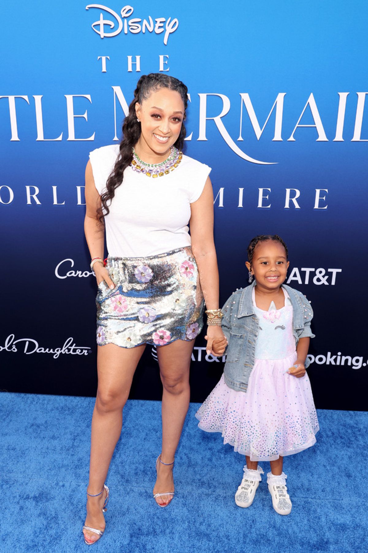 LOS ANGELES, CALIFORNIA - MAY 08: (L-R) Tia Mowry and Cairo Tiahna Hardrict attend the World Premiere of Disney's live-action feature 'The Little Mermaid' at the Dolby Theatre in Los Angeles, California on May 08, 2023. (Photo by Jesse Grant/Getty Images for Disney) at 