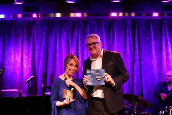 Richard Hillman wins the mousepad. Photo