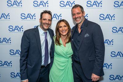 SAY Executive  Director Noah Cornman and SAY Honorees Peter Hermann and Mariska Hargi Photo