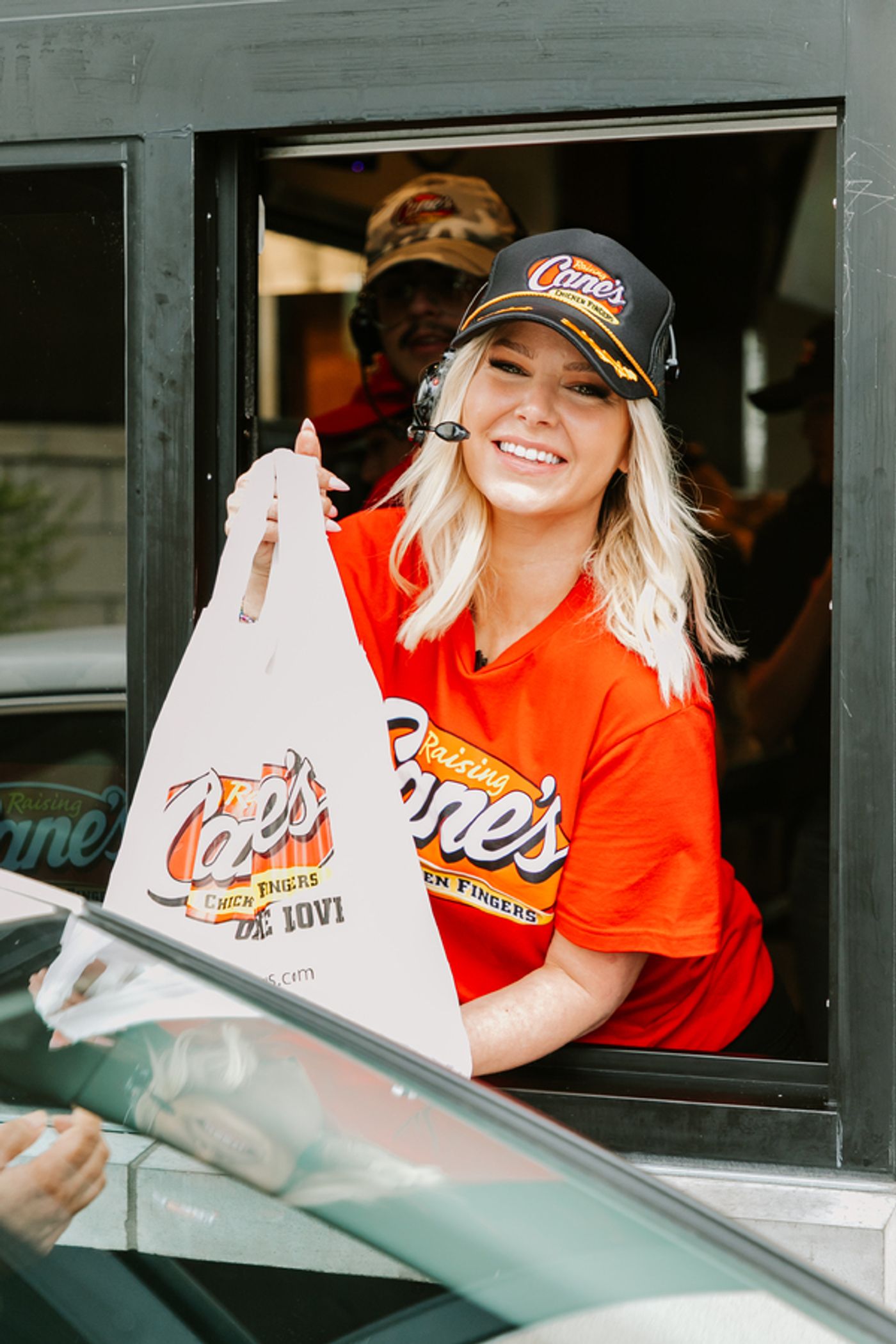 Photos: Ariana Madix Puts Sauce in the #Scandoval, Serves Caniacs at Raising Cane's in El Segundo, CA  Image