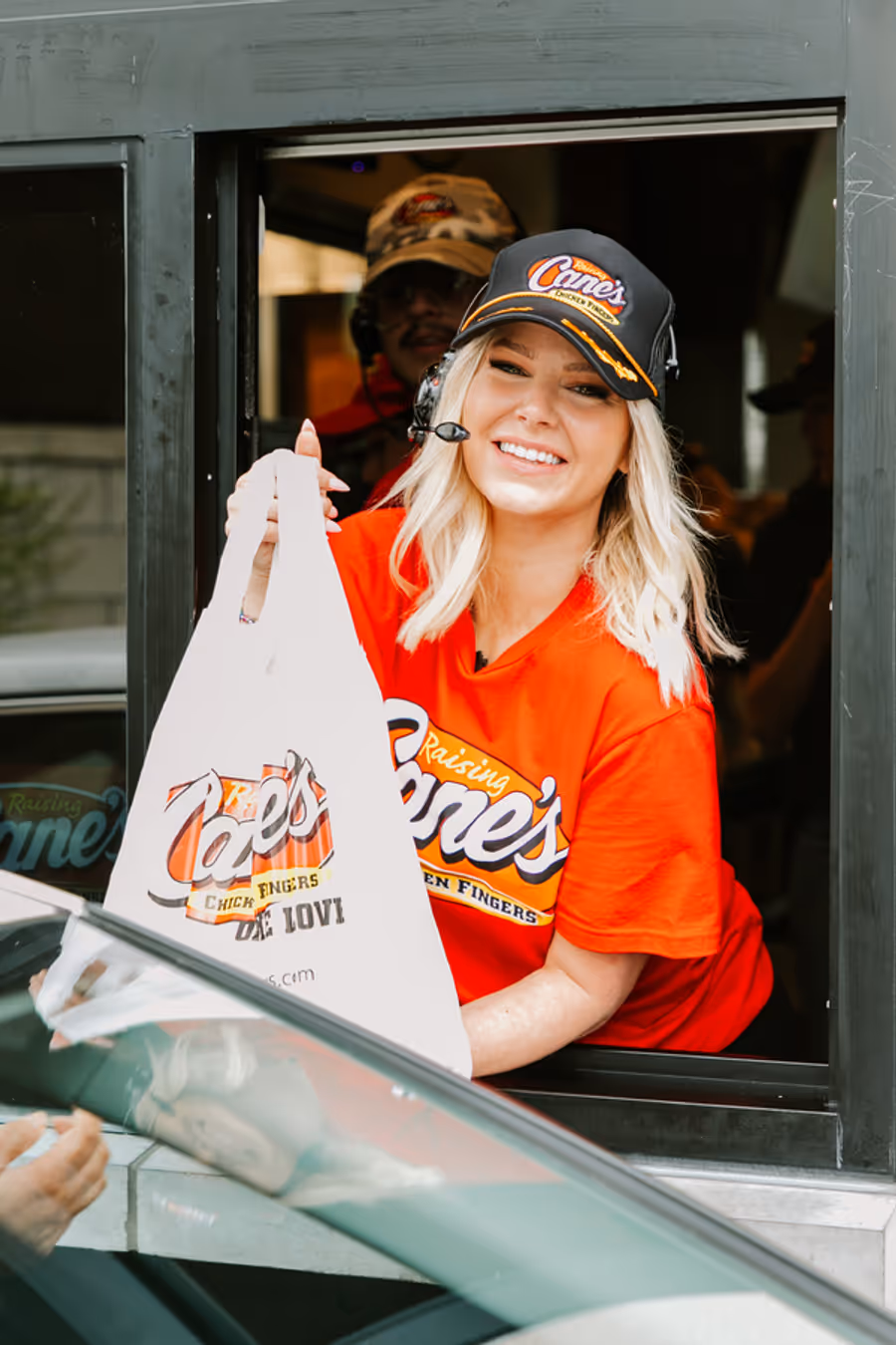 Photos: Ariana Madix Puts Sauce in the #Scandoval, Serves Caniacs at Raising Cane's in El Segundo, CA Image