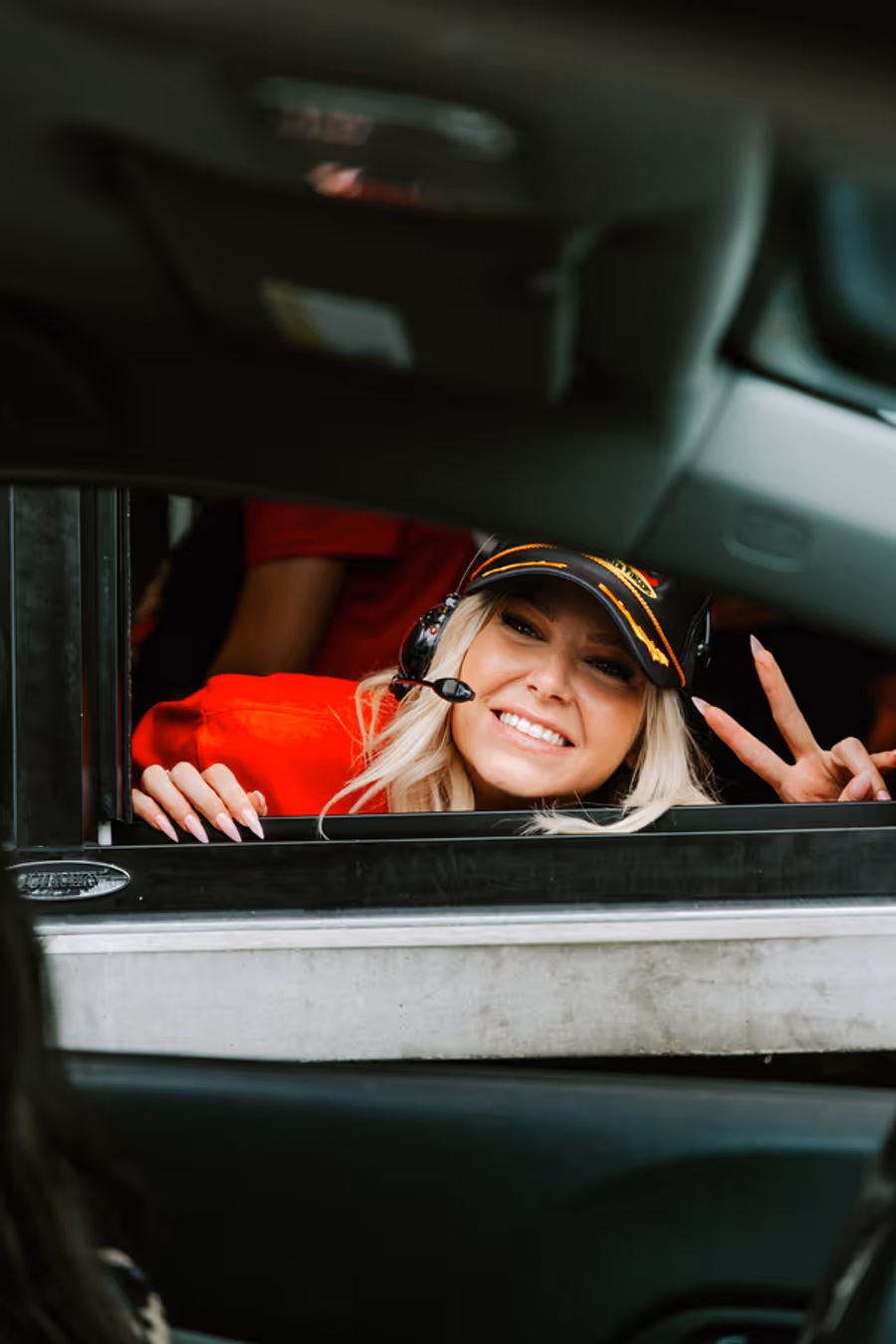 Photos: Ariana Madix Puts Sauce in the #Scandoval, Serves Caniacs at Raising Cane's in El Segundo, CA Image