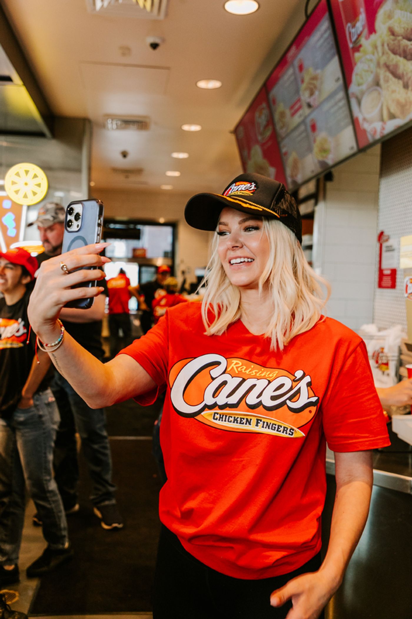 Photos: Ariana Madix Puts Sauce in the #Scandoval, Serves Caniacs at Raising Cane's in El Segundo, CA  Image