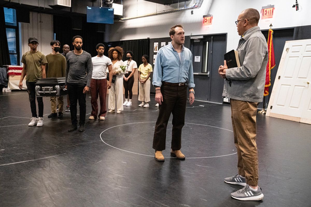 Nick Rehberger (center), Tyrone Mitchell Henderson (right), and the company at 