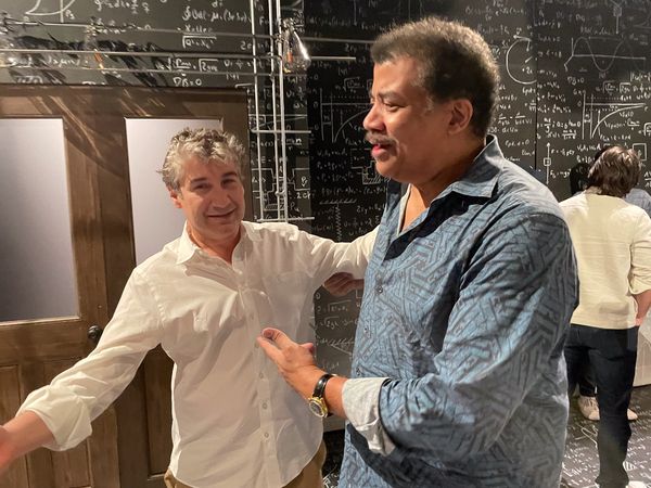 Director Scott Schwartz and Neil deGrasse Tyson talk shop Photo