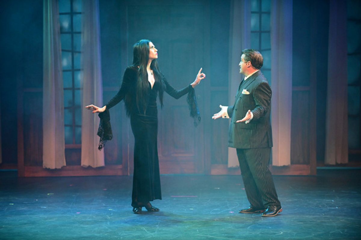 Stacey Harris* (Morticia) and Carlos Lopez* (Gomez) at 