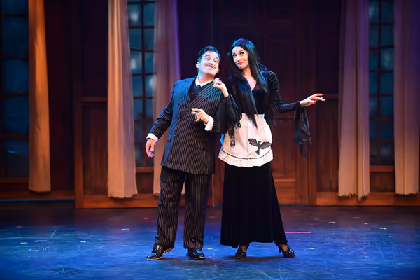 Stacey Harris* (Morticia) and Carlos Lopez* (Gomez)  Photo