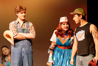 Ben Roe as Willard Hewitt, Melissa Barrera Gonzalez as Betty, and Michael L. Salinas  Photo