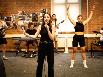 Sarah Moss, Amy Bastani, and the Cast of ONCE Photo