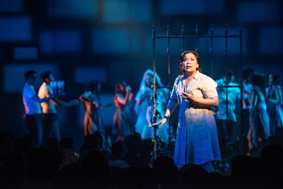 Melody Butiu (Estrella Cumpas) and the cast of Here Lies Love
 Photo