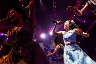 Arielle Jacobs (Imelda Marcos) and the cast of Here Lies Love
 Photo