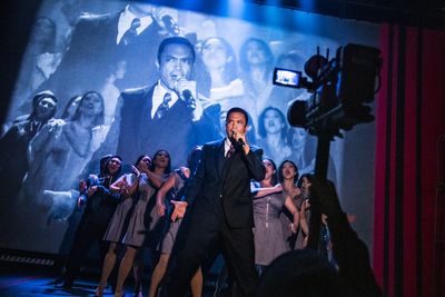 Jose Llana (Ferdinand Marcos) and the cast of Here Lies Love
 Photo