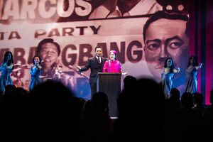 Jose Llana (Ferdinand Marcos), Arielle Jacobs (Imelda Marcos), and the cast of Here L Photo