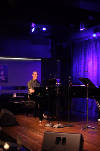 Musical Director Lon Hoyt on Piano. Photo