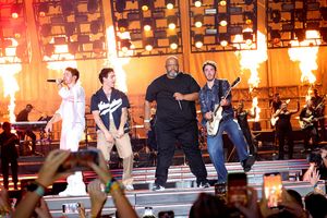 Nick Jonas, Joe Jonas, Robert "Big Rob" Feggans, and Kevin Jonas Photo