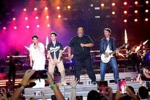 Nick Jonas, Joe Jonas, Robert "Big Rob" Feggans, and Kevin Jonas Photo