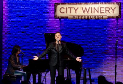 Travis Moser performing Anyone Can Whistle with Drew Wutke. Photo