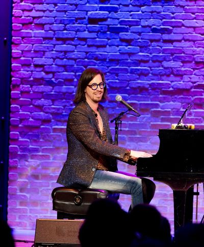 Musical Director/pianist, Drew Wutke during the show.  Photo