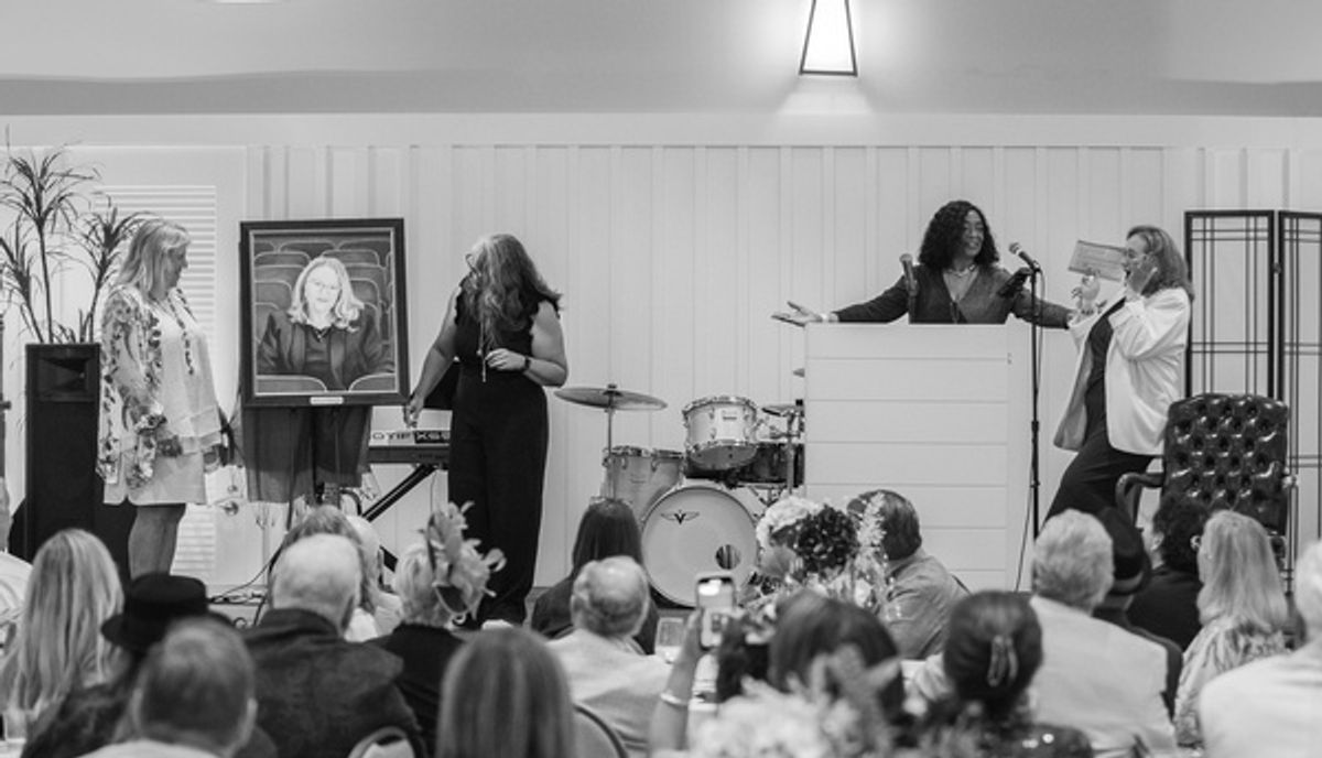 Gloria Banks presents the portrait of Kathy Brombacher. at 