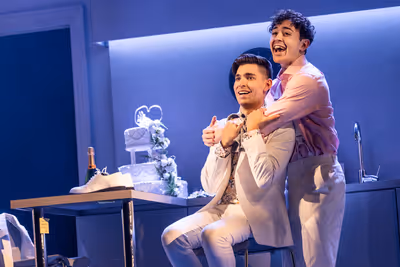 Matt Rodin as Jamie and Ali Louis Bourzgui as Paul in the North American Tour of COMP Photo