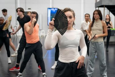 Martha Kirby (Eva Per n) and the cast of Evita - Photography by Marc Brenner Photo