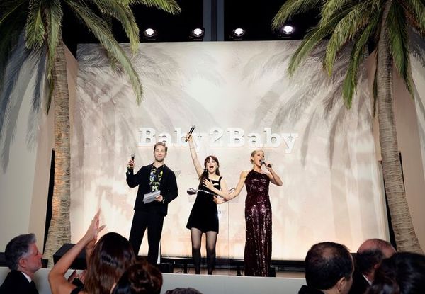 Robbie Gordy, Zooey Deschanel, and Julie Bowen Photo