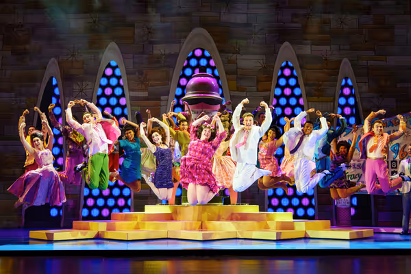 (Center) Caroline Eiseman and company Photo