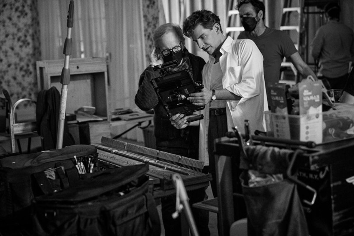 Producer Steven Spielberg and Writer/Director/Producer Bradley Cooper as Leonard Bernstein on the set of Maestro at 