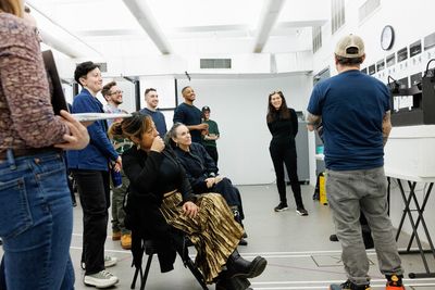 Diane Paulus and P. Carl (right) address the company and staff Photo