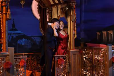 Bowen Yang as Christian and Ariana Grande as Satine during the "Moulin Rouge" skit Photo