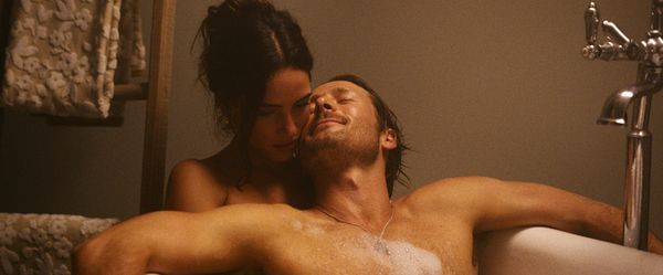 Adria Arjona and Glen Powell Photo