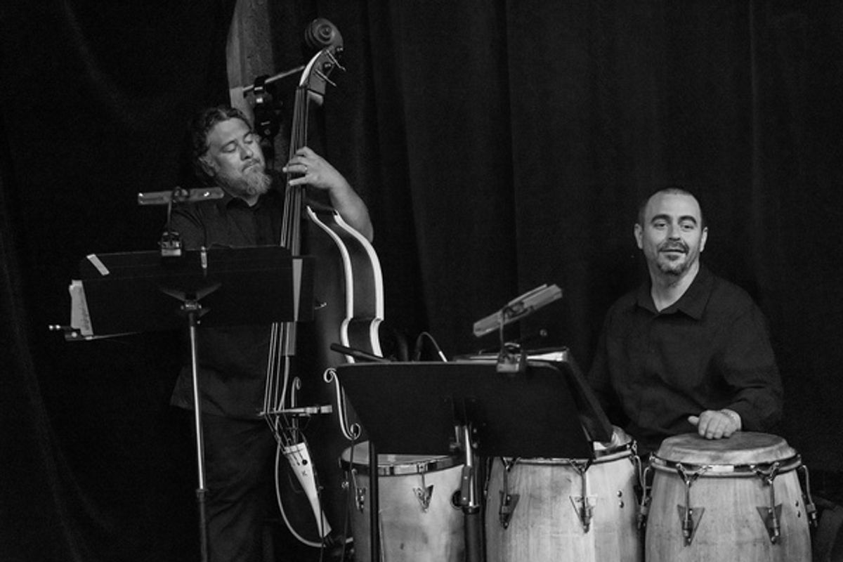Bass player Juan Perez and and music director Alberto L pez  Photo by Grettel Cortes Photography at 