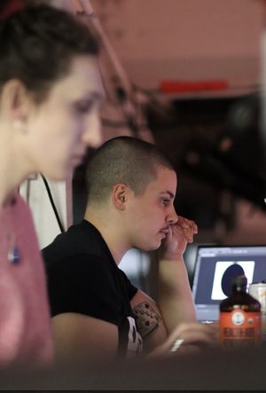 Cosette Pin (video and sound designer) and Jacqueline Scaletta (lighting designer) in the booth @ BroadwayWorld Cosette Pin (video and sound designer) and Jacqueline Scaletta (lighting designer) in Photo