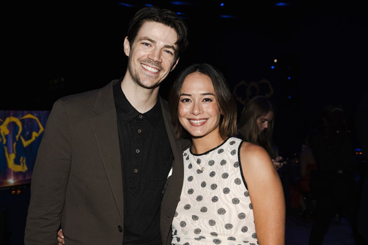 Grant Gustin and LA Thoma Gustin at 