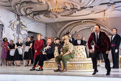 Front right: Zachary Nelson, the ensemble of Der Rosenkavalier Photo