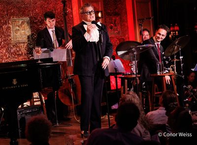 Isaac Mizrahi and band (Daniel Duke on drums, Joe Strasser on bass, and James Sarno o Photo