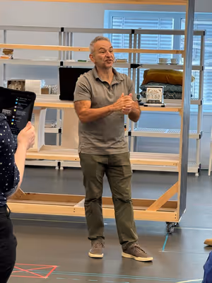 Playwright Joe DiPietro address the cast and creative team of Babbitt. Photo