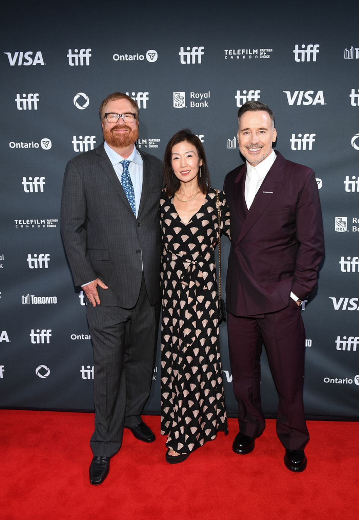 R. J. Cutler, Jane Cha Cutler, and David Furnish at 