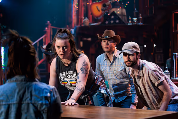 Kelly McIntyre and Ethan Hardy Benson and Eric Michael Byers Photo