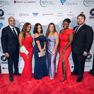 Presenting Sponsor Representatives from Sbaiti & Company with Marissa Ghavami Photo