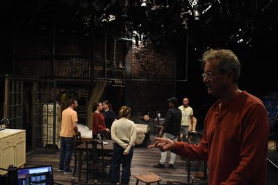 Director Stephen Hamilton (foreground) on set with cast Photo