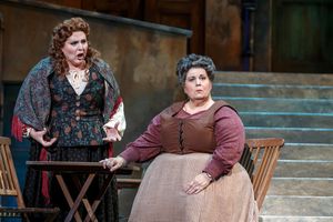 Santuzza (Eve Gigliotti, left) implores Mamma Lucia (Marianne Cornetti) to hear her out @ BroadwayWorld Santuzza (Eve Gigliotti, left) implores Mamma Lucia (Marianne Cornetti) to hear her o Photo