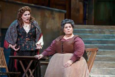 Santuzza (Eve Gigliotti, left) implores Mamma Lucia (Marianne Cornetti) to hear her o Photo