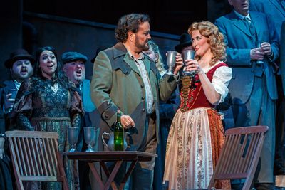Turiddu (Rafael Davila) toasts his married mistress Lola (Audrey Welsh) Photo