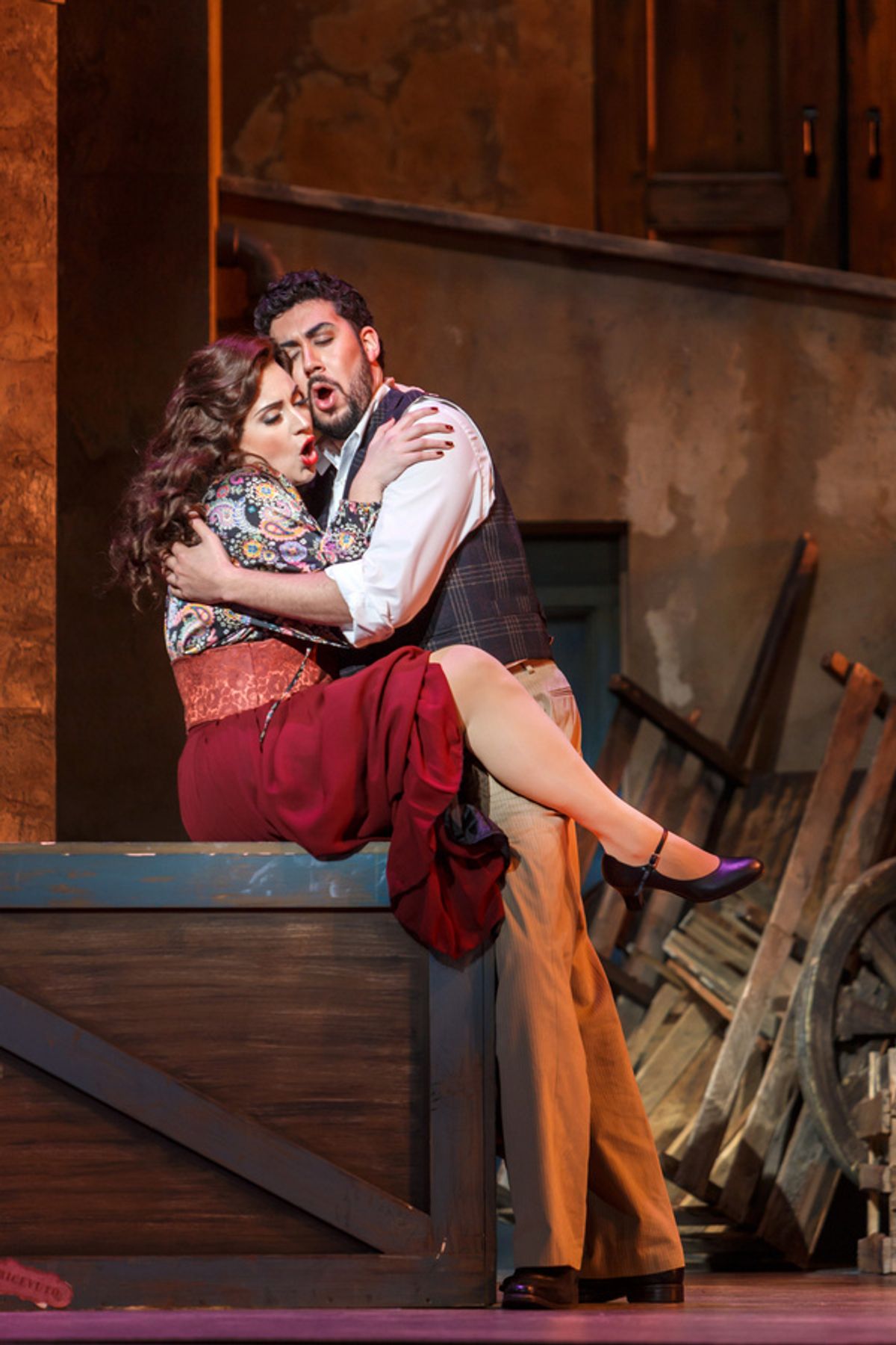 Nedda (Caitlin Gotimer) and Silvio (Ricardo Jose Rivera) embrace at 
