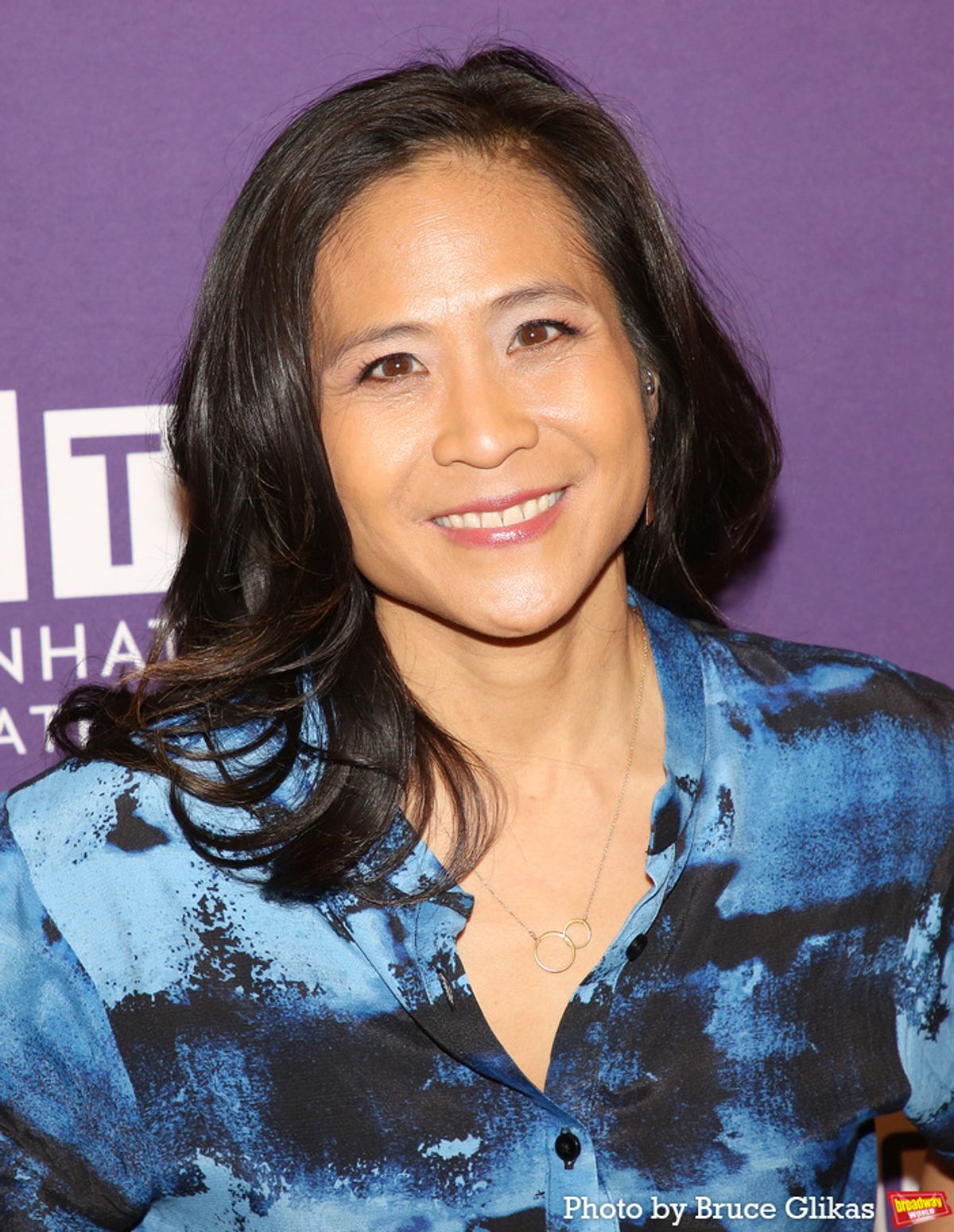 Director May Adrales at 